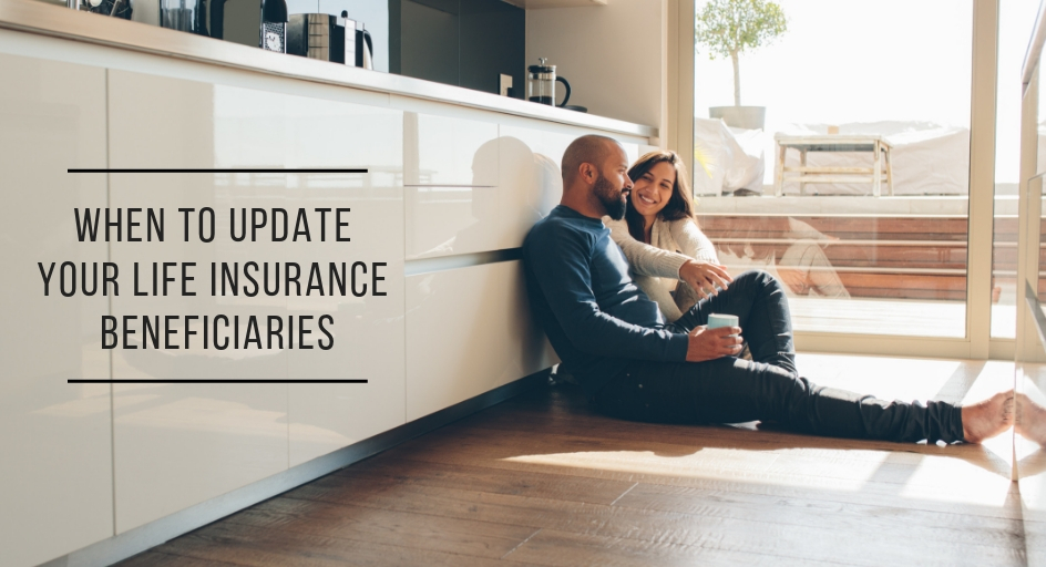 blog image of young couple sitting on the floor of their kitchen talking; blog title: When to Update Your Life Insurance Beneficiaries